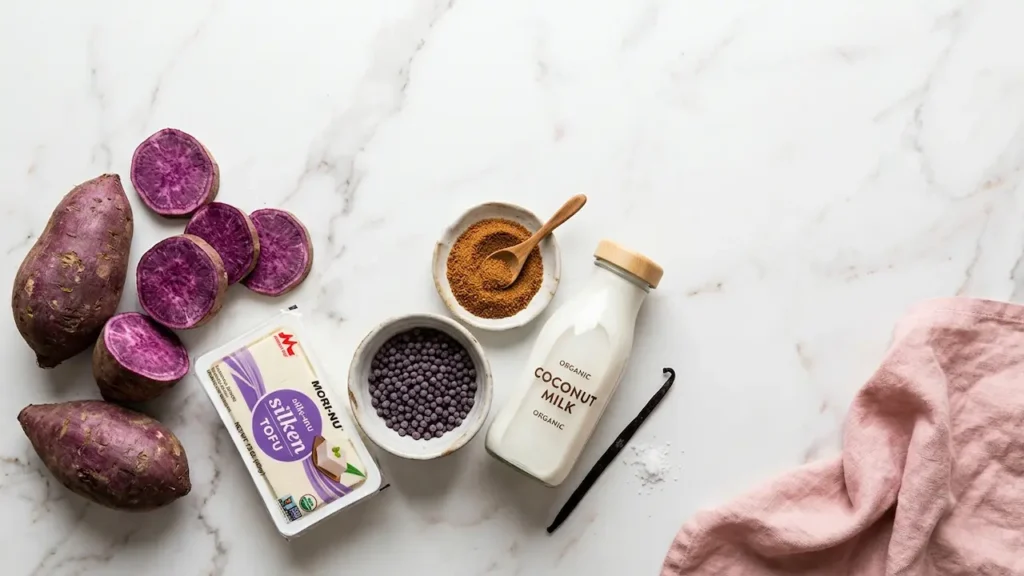 Best Ube Taho Recipe: 5 Easy Steps to Filipino Purple Dessert (2026) 5 Ube taho recipe ingredients: fresh purple yam, silken tofu, tapioca pearls, coconut milk, brown sugar, and vanilla on marble.